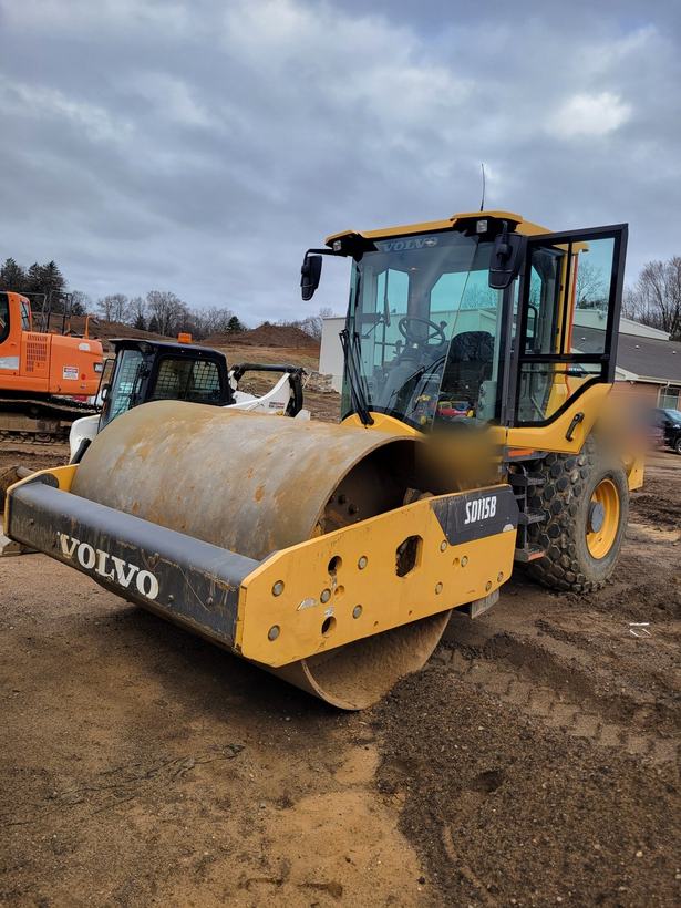 Telematics install on a vibratory soil compactor at a construction site